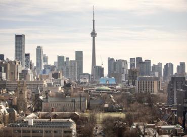 Photo of Toronto skyline and U of T downtown campus
